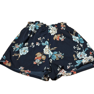 Floral woman’s shorts size small dark blue with flowers SHEIN